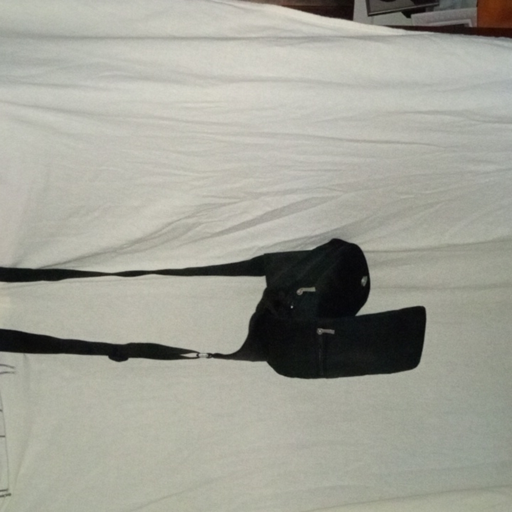 Motorcycle cross body pocket book